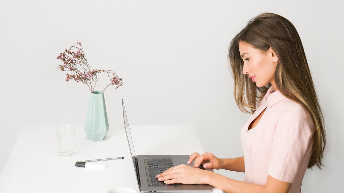 A biller working through claims for several clinics from one screen