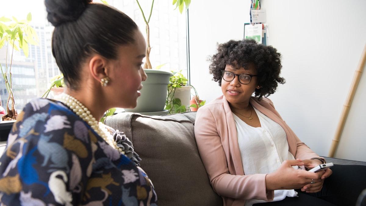 Two therapists at a small practice planning the week together